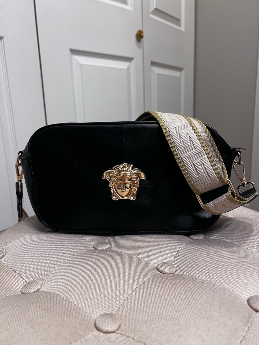 Fashion inspired Black  Crossbody Bag with Gold Medallion and Woven Strap